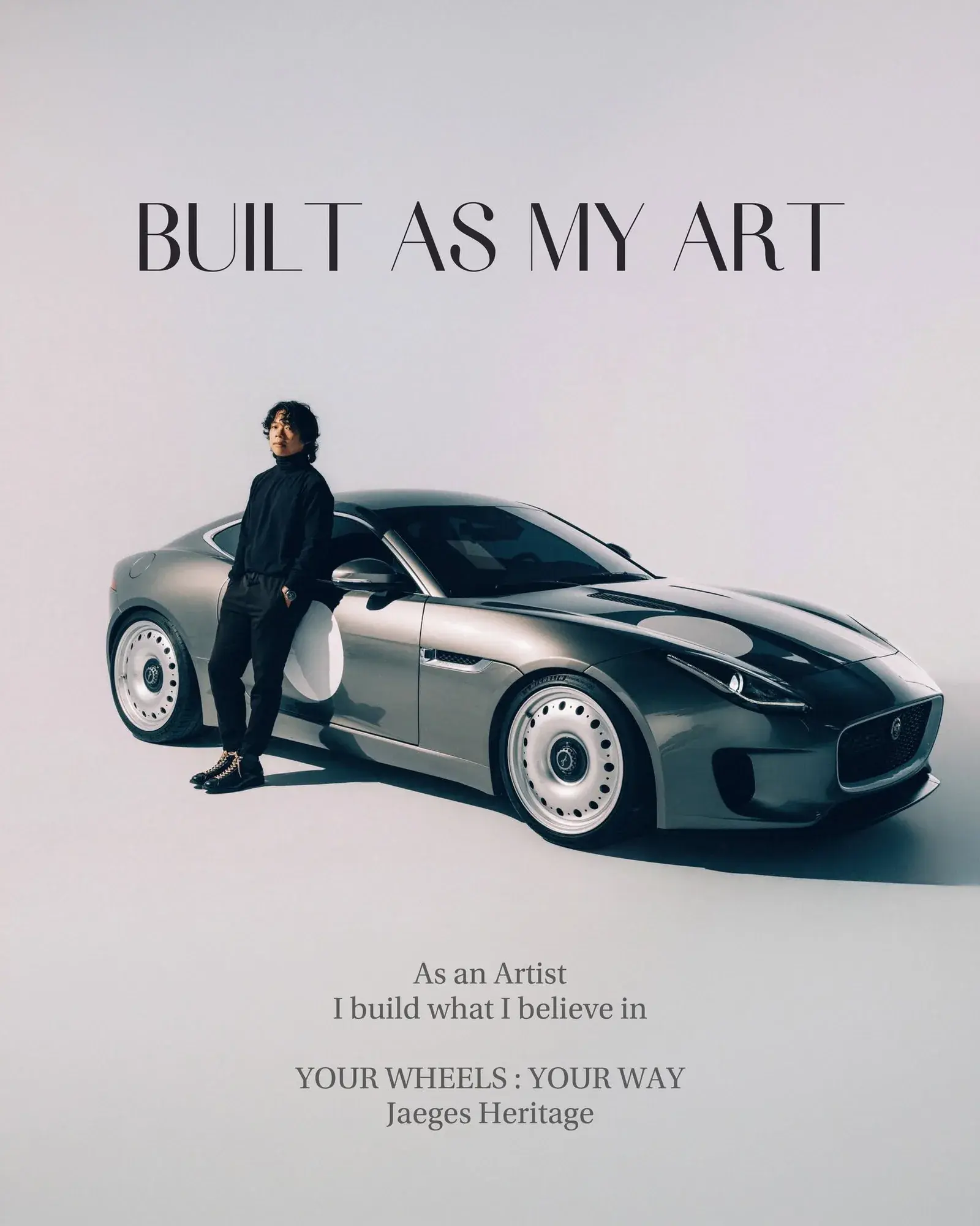 Designer standing beside a Jaguar F-Type for Jaegers Heritage