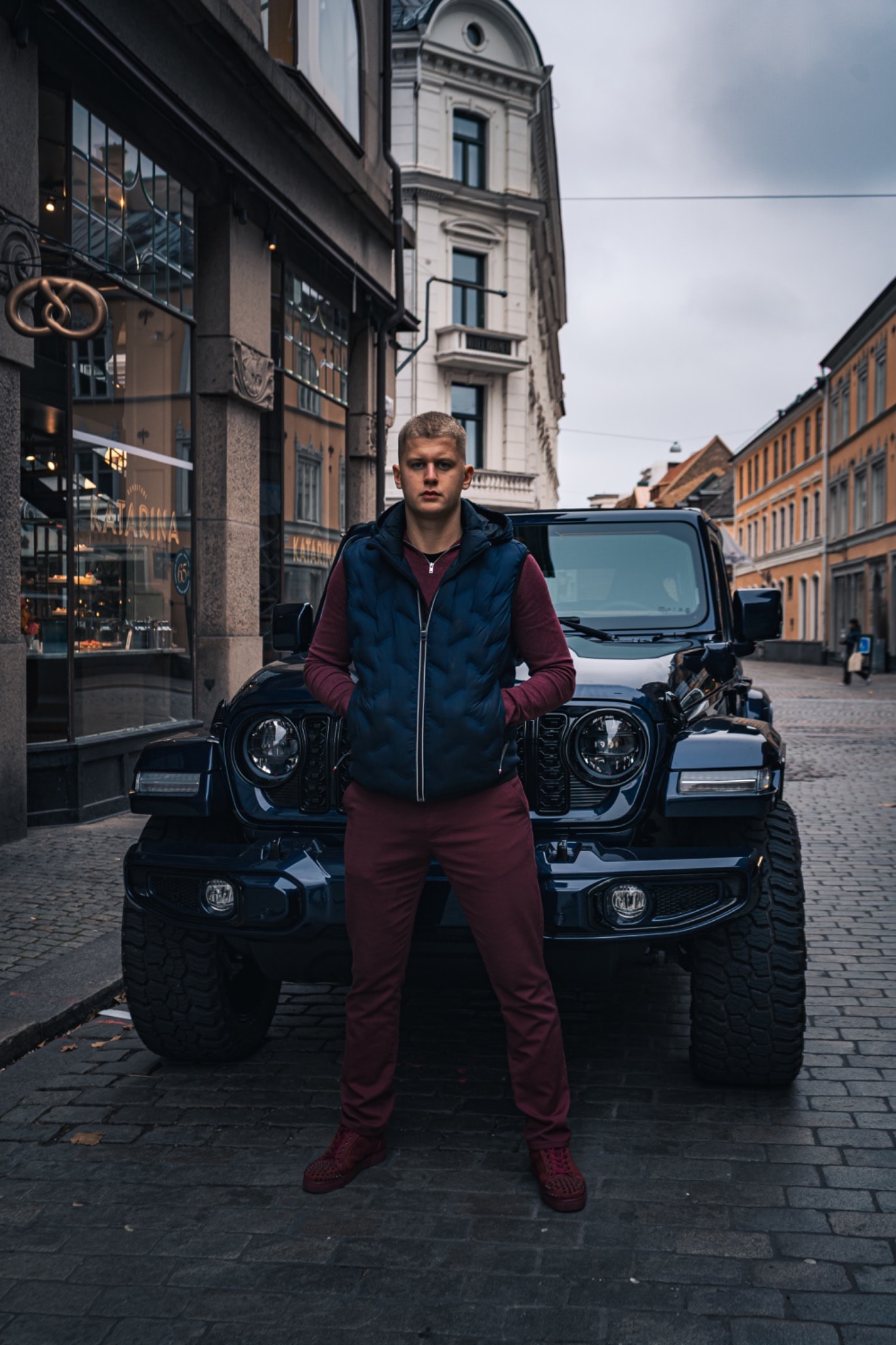 Nordic Motors representative in front of a BRUTE Jeep in Copenhagen
